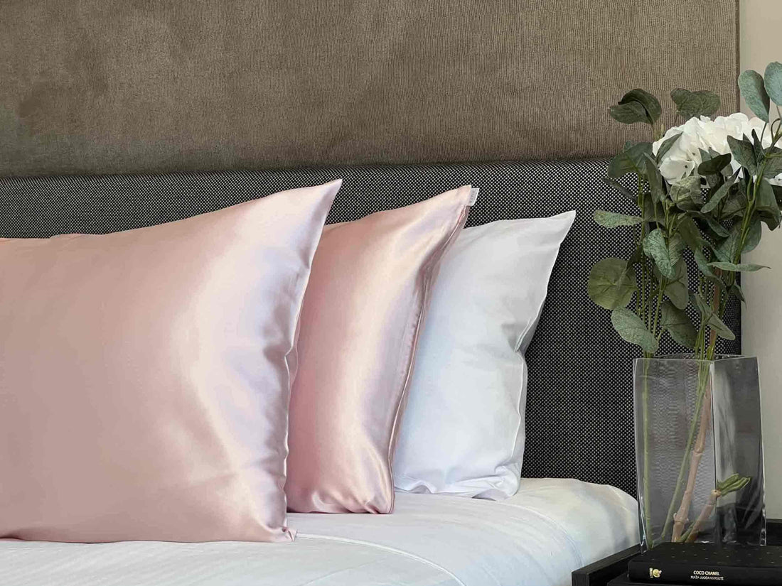 Get the beauty sleep you deserve with our Hyaluronic Acid Infused Silk Pillowcases. The silky smooth fabric is gentle on your skin and hair while the infused Hyaluronic Acid provides hydration, leaving you with a refreshed and rejuvenated complexion. Say goodbye to bed head and wake up to a glowing complexion every morning.