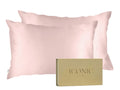 Get the beauty sleep you deserve with our Hyaluronic Acid Infused Silk Pillowcases. The silky smooth fabric is gentle on your skin and hair while the infused Hyaluronic Acid provides hydration, leaving you with a refreshed and rejuvenated complexion. Say goodbye to bed head and wake up to a glowing complexion every morning.