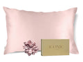 Get the beauty sleep you deserve with our Hyaluronic Acid Infused Silk Pillowcase and a scrunchie. The silky smooth fabric is gentle on your skin and hair while the infused hyaluronic acid provides hydration, leaving you with a refreshed and rejuvenated complexion. Say goodbye to bed head and wake up to a glowing complexion every morning.